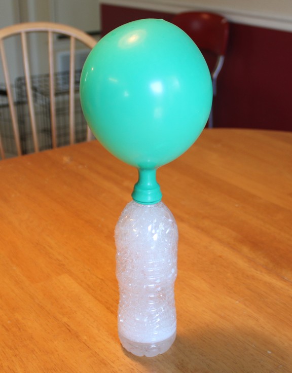 http://frugalfun4boys.com/2011/11/10/blow-up-a-balloon-with-baking-soda-and-vinegar/