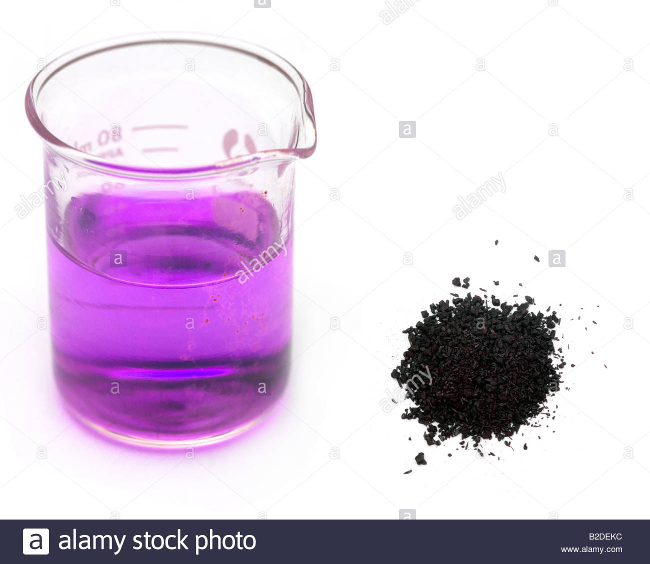 http://www.alamy.com/stock-photo-crystals-of-potassium-permanganate-and-a-beaker-containing-purple-18736576.html
