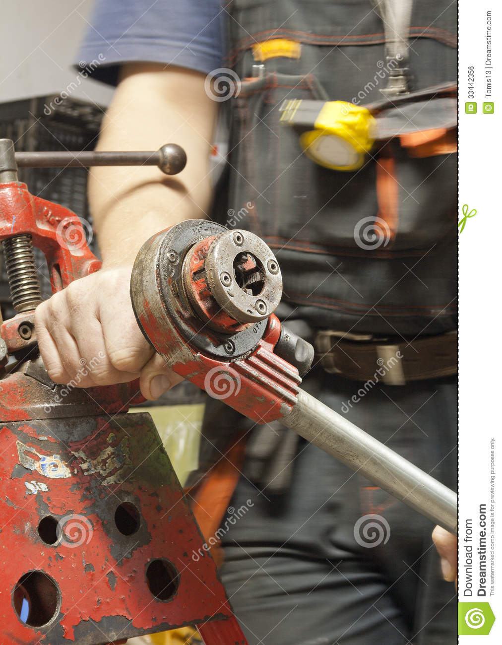 https://www.dreamstime.com/royalty-free-stock-image-threading-steel-pipe-male-hand-special-vise-image33442356